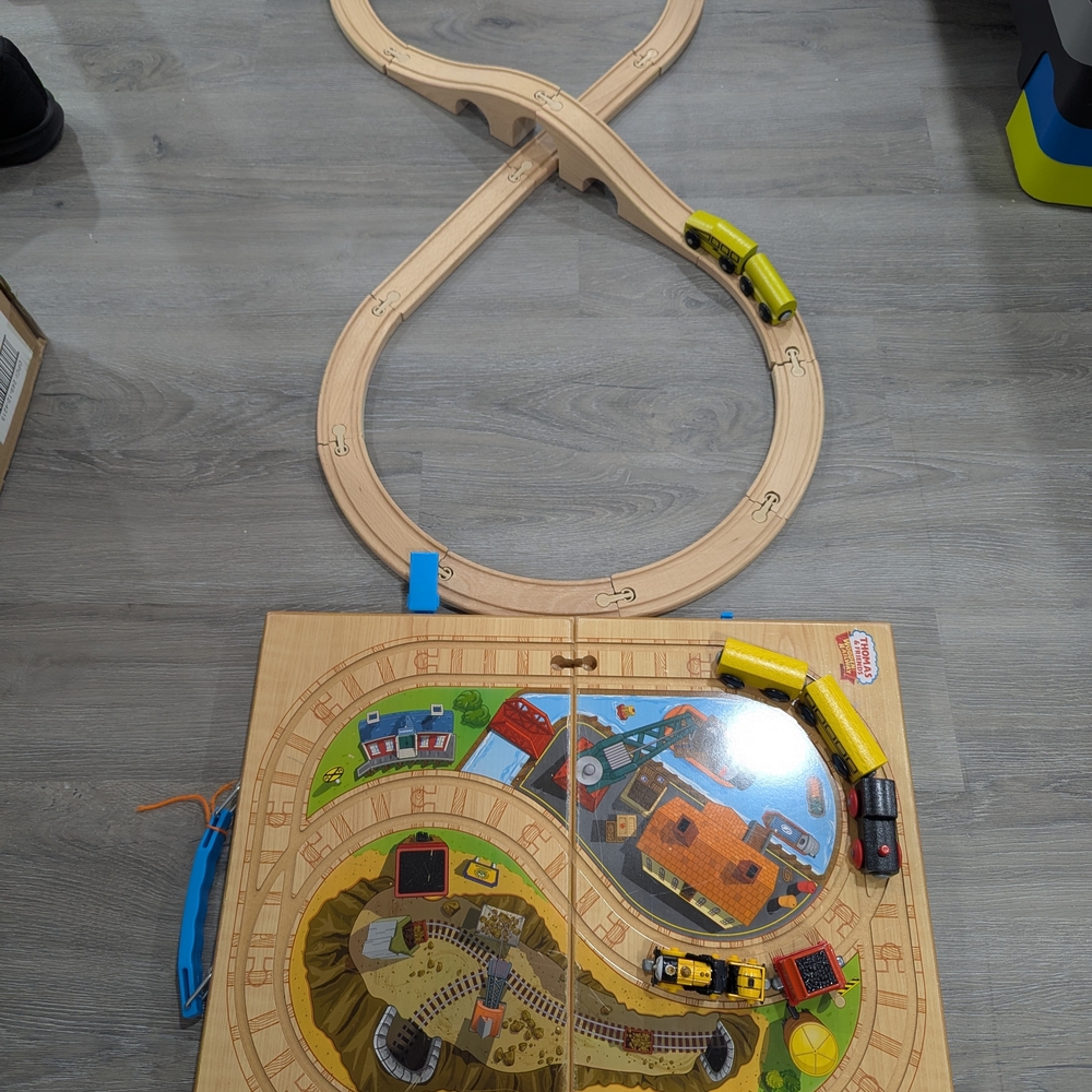 Colorful Wooden Train Set with Yellow and Black Engines